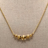 Mini Guayacán Flower Necklace – 5 Flowers