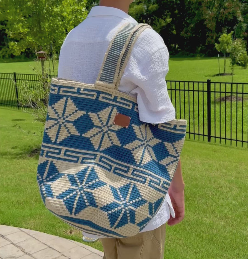 https://ampmsis.com/products/wayuu-geometric-mochilon-large-bucket-bag-navy-blue-beige?variant=46141557178504
