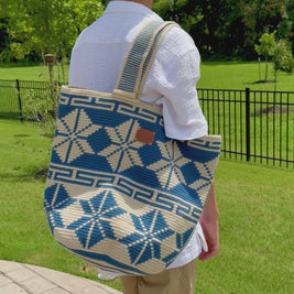 https://ampmsis.com/products/wayuu-geometric-mochilon-large-bucket-bag-navy-blue-beige?variant=46141557178504