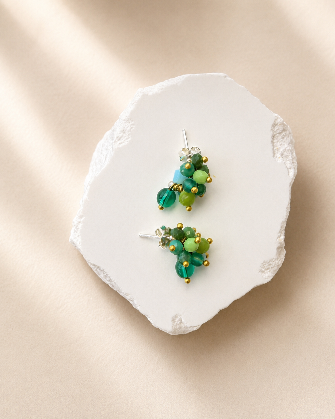 products/emerald-forest-green-gemstone-cluster-studs1